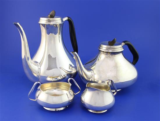 A stylish 1950s Danish silver four piece tea and coffee service by Svend Toxvaerd, gross 46.5 oz.